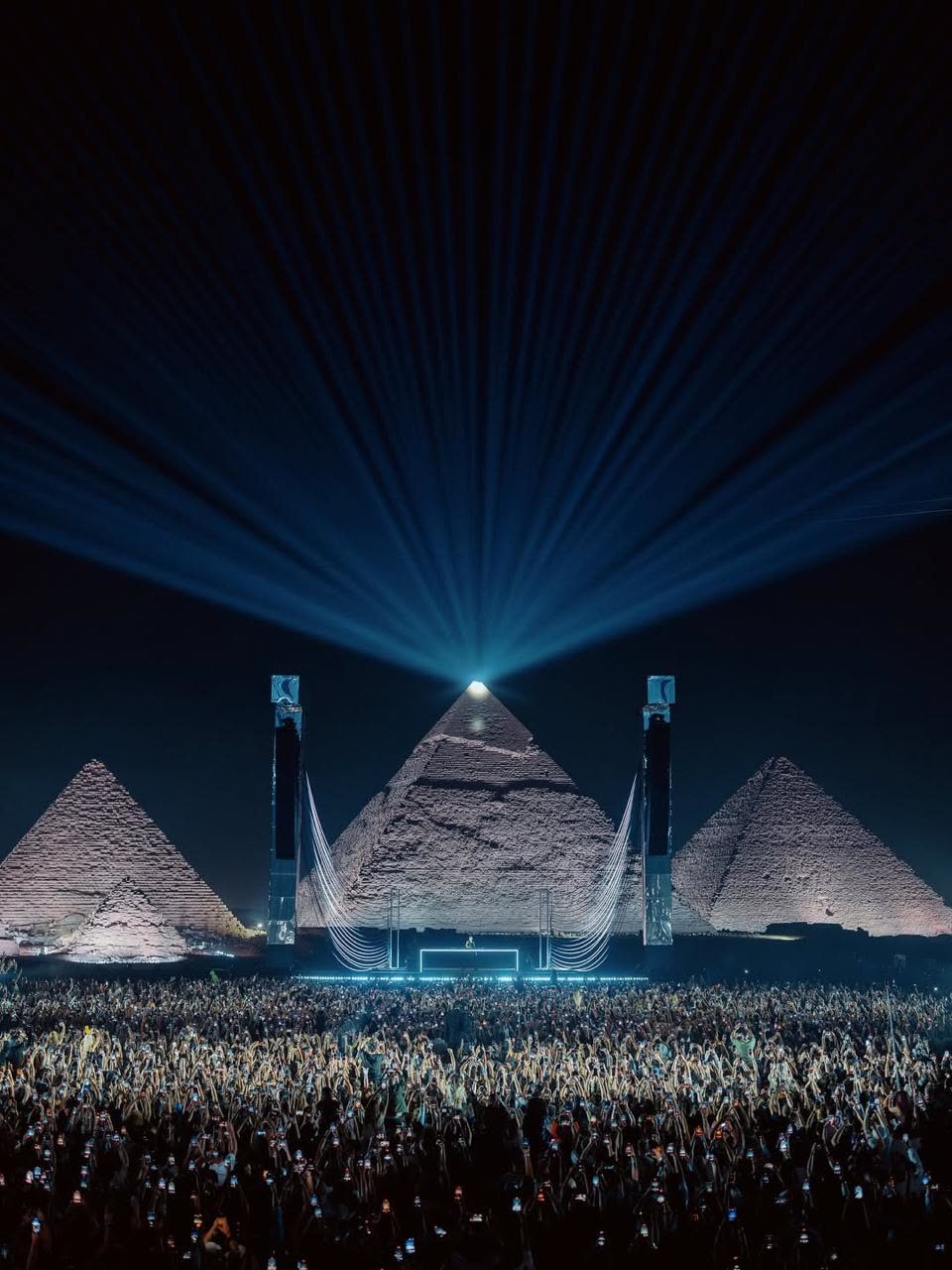 Light beams over the Pyramids of Giza